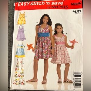 McCall’s M9229 Girls' Pink Floral Halter Sundress - Easy Stitch 'n Save uncut